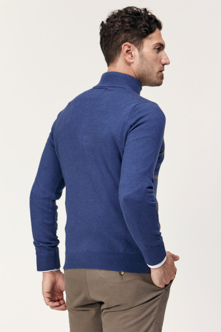 Sweater medio cierre a rayas