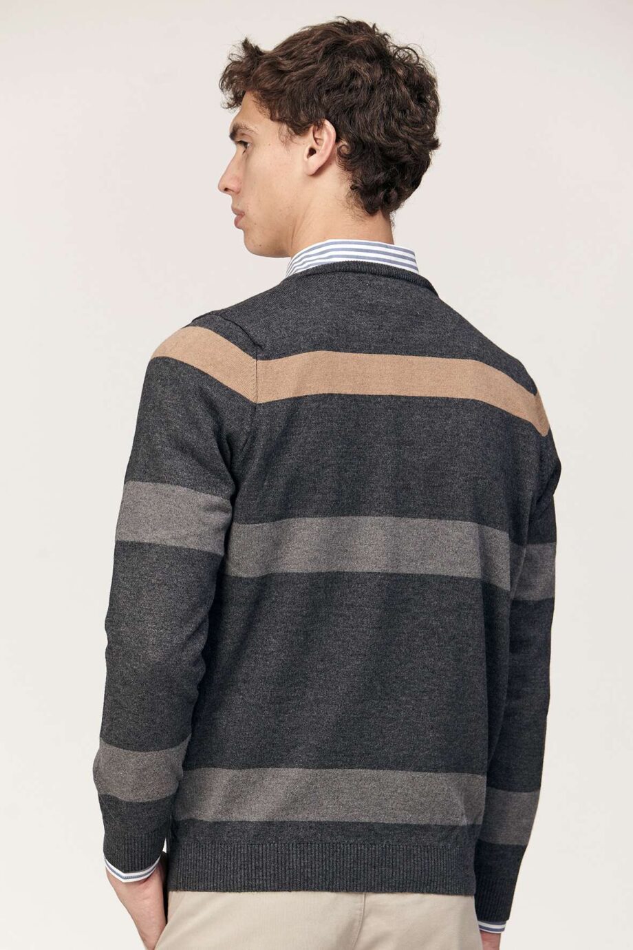 Sweater escote redondo a rayas