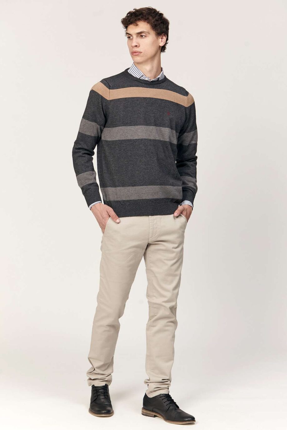 Sweater escote redondo a rayas