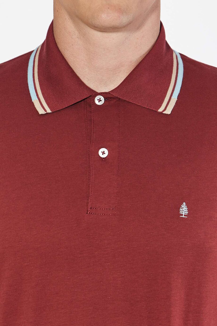 Polo mangas cortas cuello puños vivos