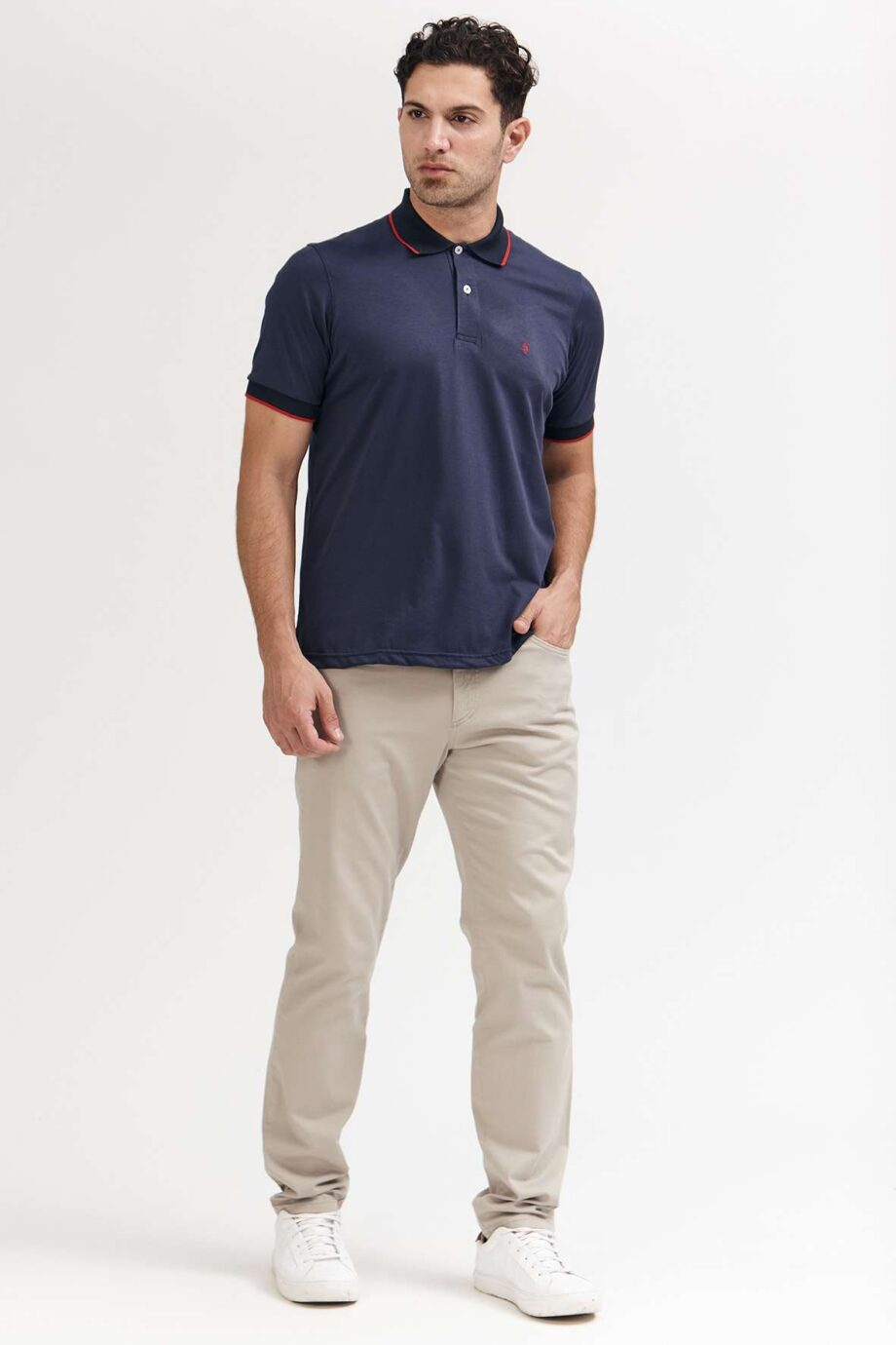 Polo mangas cortas cuello puños vivos