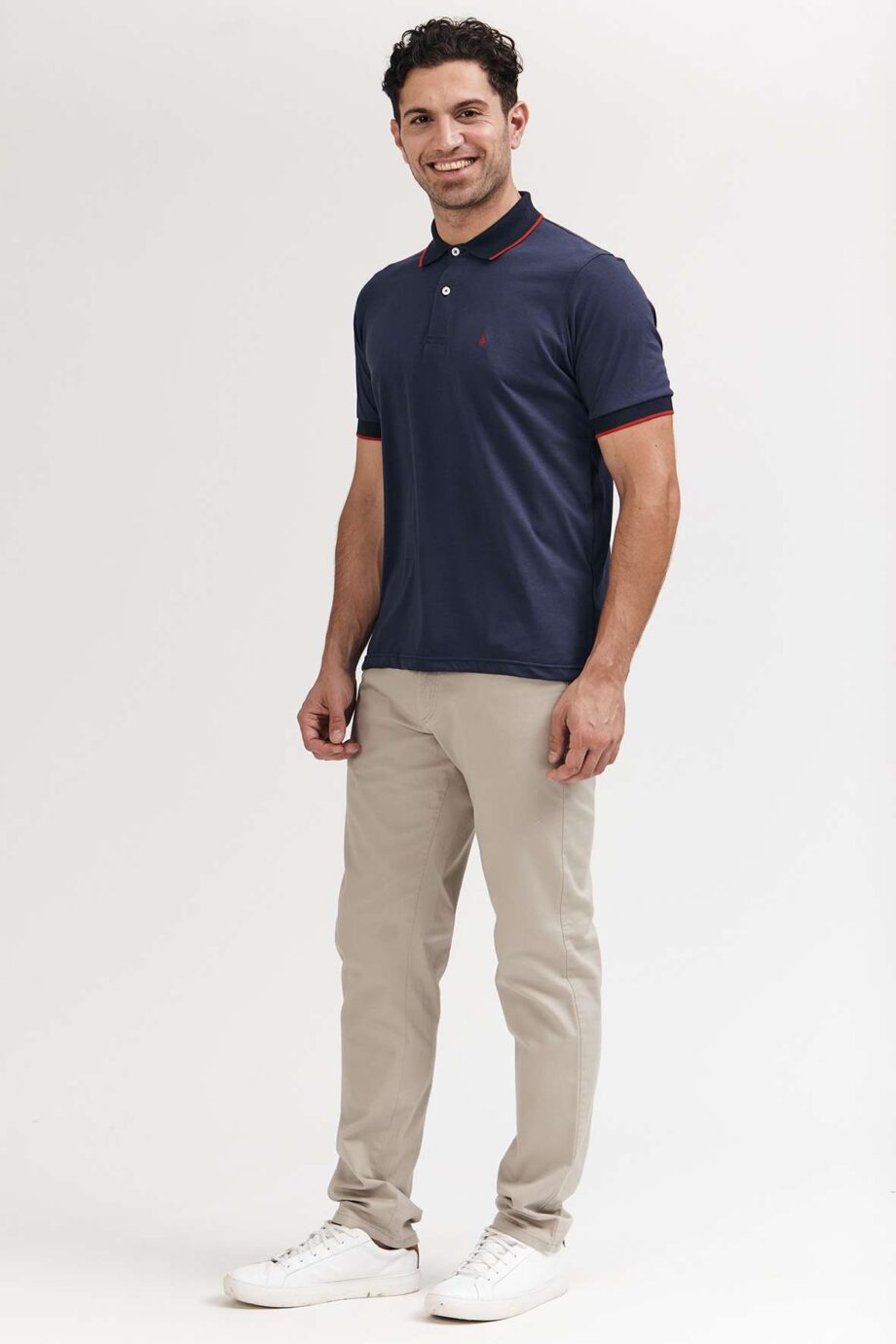 Polo mangas cortas cuello puños vivos
